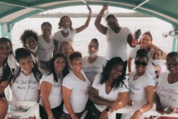 a group of people posing for the camera